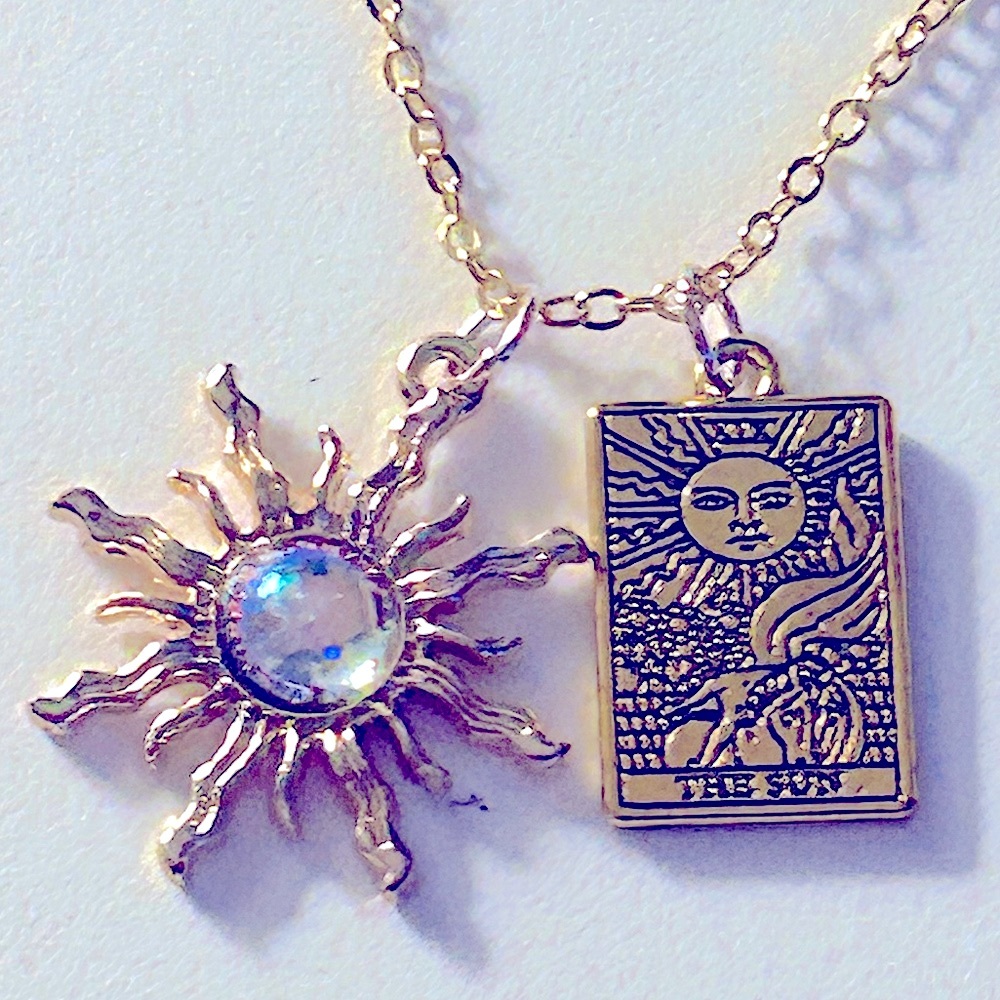 NWOT necklace Sun w “opal” center, The Sun Tarot Card etched goldtone charms 16”